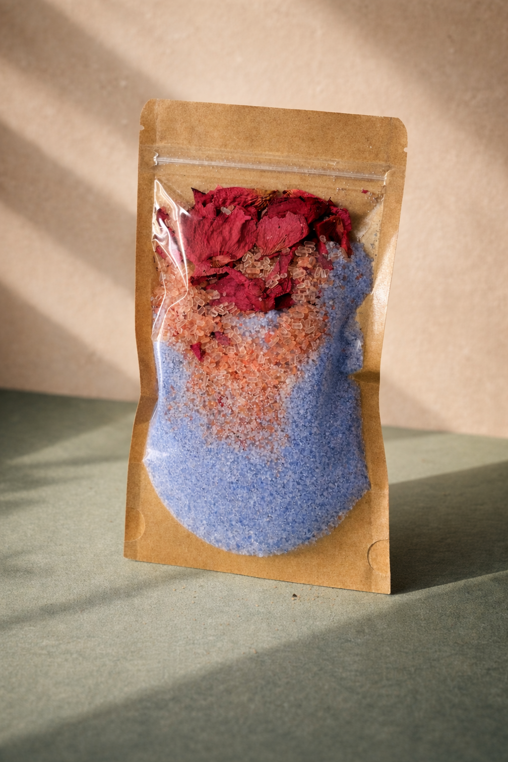 https://cdn.shopify.com/s/files/1/0781/2684/2088/files/Layered_bath_salts_with_rose_petals.png?v=1775904763